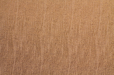 披著波浪的藍(lán)綠色羊毛織物與合成纖維織物的對(duì)比與融合